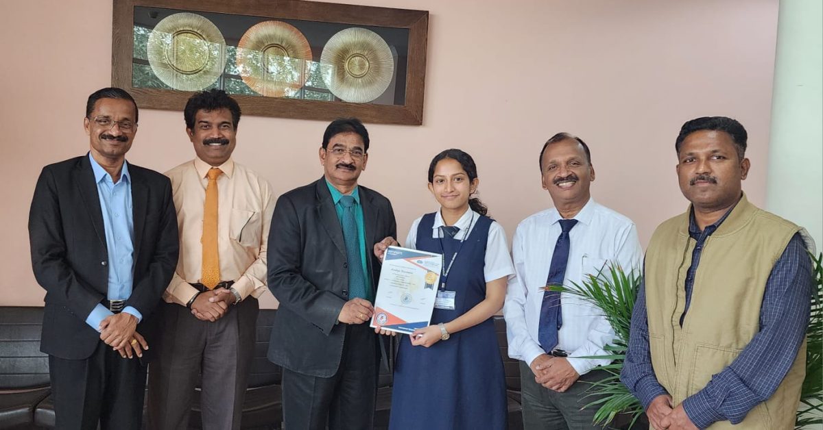 Aradhya receives certificate from Principal VR Planiswamy